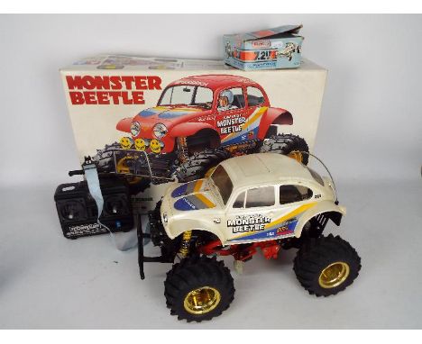 Tamiya - A 1:10 scale radio control VW Monster Beetle # 58060. The car has been assembled and used and still has the original