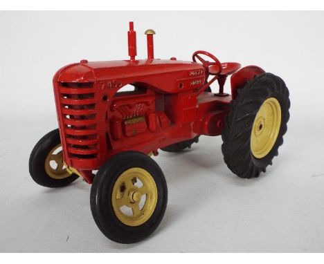 Lesney, Matchbox  - An unboxed Lesney large scale Massey-Harris 745D Tractor. The tractor finished in red with beige coloured