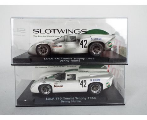 Slotwings - 2 x boxed Lola T70 models of the same car, a clean pre race version and a dirty post race version of the car Denn