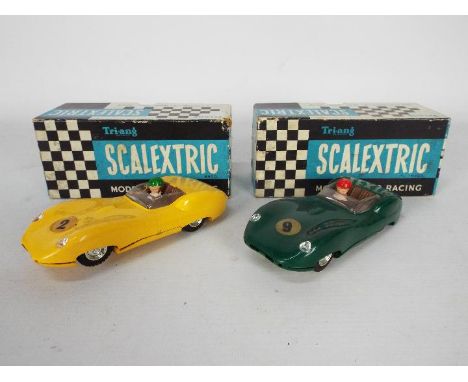 Scalextric - 2 x boxed vintage Lister Jaguars # MM/C.56 one in Yellow and one in BRG both with the correct colour spot boxes.