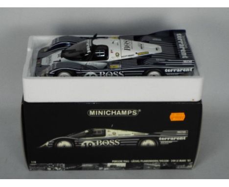 Minichamps - A boxed 1:18 scale Porsche 956L 24H Lemans 1983 'Lassig/Plankenhorn/Wilson'. The model appears Mint sat within a