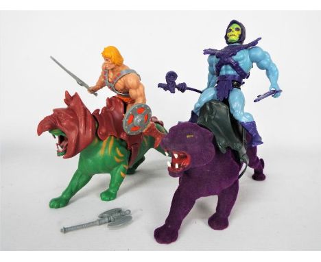 Mattel - An unboxed vintage Masters of the Universe He-Man with Battle Cat together with an unboxed Skeletor and Panthor by M