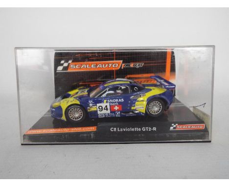 Scaleauto - A boxed 1:32 scale Spyker C8 Laviolette GT2-R as raced at the 2008 Le Mans 24 Hours. The model appears Mint in a 