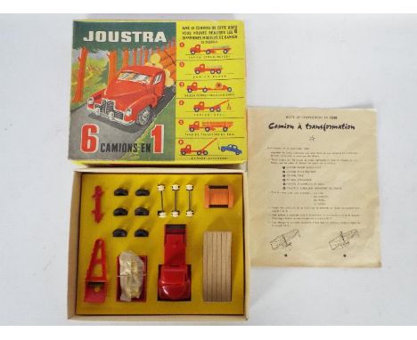 Joustra - A boxed vintage 6 in 1 Camion set # 1018. This plastic truck with interchangeable backs and wooden loads appears to