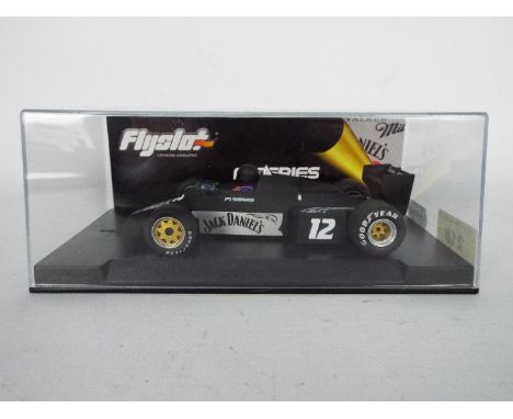 Flyslot - A boxed 1:32 scale Williams FW08C F1 Series Jack Daniels Edition car. The model appears Mint in a Very Good display