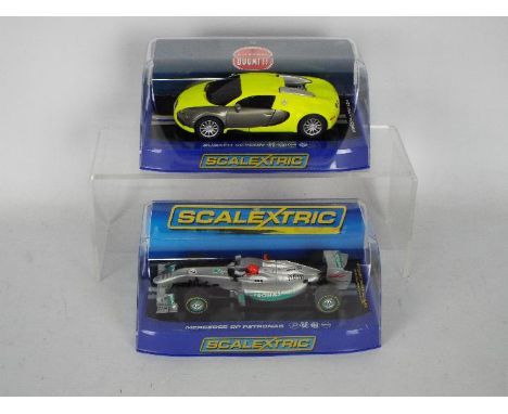 Scalextric - Two boxed 1:32 scale slot cars from Scalextric. Lot consists of Scalextric C3275 Bugatti Veyron; together with C