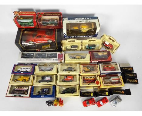 Bburago - Matchbox - Lledo - A collection of 30 x mostly boxed models in various scales including Williams Renault FW14, Lled