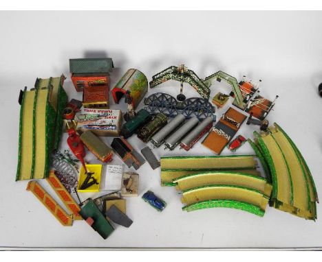 Gely, Bing, Kibri, Sutcliffe, Other - A collection of unboxed mainly tinplate model railway accessories, parts and toys from 