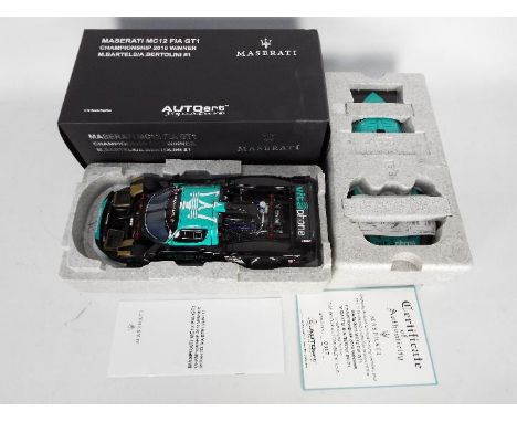 AUTOart Signature - A limited edition highly detailed Signature Series Maserati MC12 FIA GT1 2010 Championship Winner as driv