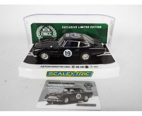 Scalextric NSCC - A 2019 limited edition National Scalextric Collectors Club Aston Martin DB5 in black with special roof deca