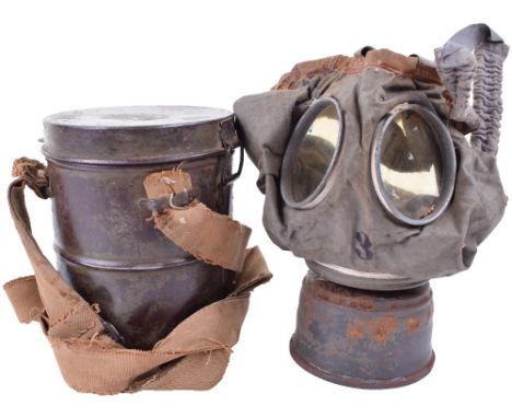 M.15/M.16 Gummi Gas Mask in Container, cylindrical tin in good order retaining virtually all of its field grey green finish, 