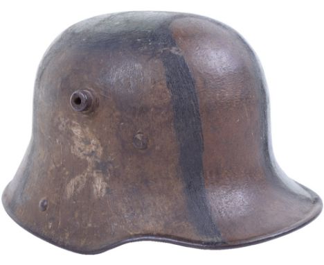 Camouflage M.17 Steel Helmet Shell, an indistinctly marked helmet which appears to be size 64, the exterior having good camou