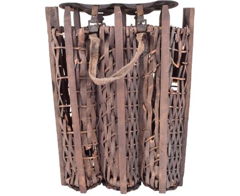 Wicker Shell Carrier, a three compartment wicker shell carrier with Hessian material carrying handle and metallic lid for car