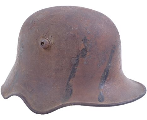 Very Rare M.18 Ear Cut Out Helmet with Remains of Camouflage Paint Finish, it is extremely rare to find a camouflage M.18 ear