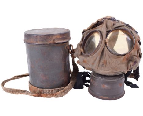 M.15 Gummi Gas Mask and Container, without ridges, retaining much of its original field grey green paint finish with instruct