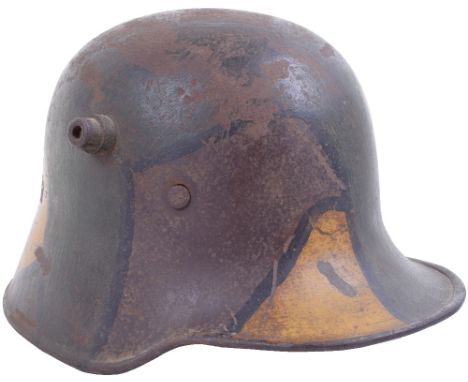 Model 1918 Camouflaged Trench Helmet, featured on pages 146-149  of Feldzug 18, any M.18 camouflage helmet is incredibly diff