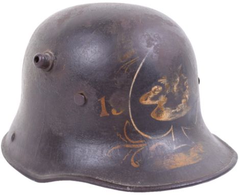 M.16 Souvenired Trench Helmet Shell, this is a size 66 M.16 steel helmet shell, which has been captured and souvenir painted,