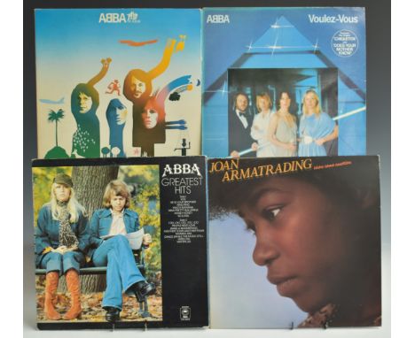 Approximately 95 albums including Abba, Amazing Blondel, David Bowie, Blondie, The Beatles, Barclay James Harvest, The Byrds,