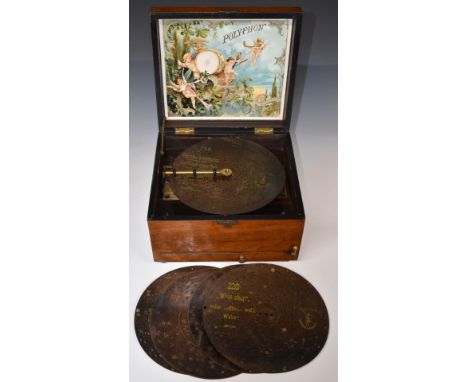 A mahogany cased table top Polyphon with 8 inch discs, 26 x 24 x 15cm