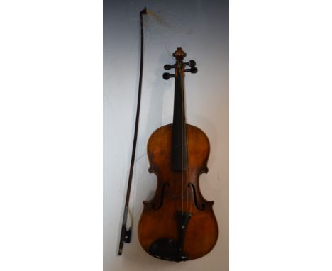 Late 19th / early 20thC violin labelled Antonius Stradivarius, with 36cm two piece back and bow, in original top loading case