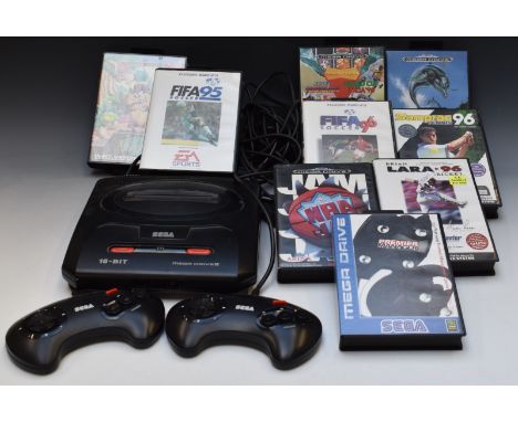 Sega Mega Drive II games console with two controllers and nine games including Echo The Dolphin, NBA Jam and Taz-Mania.