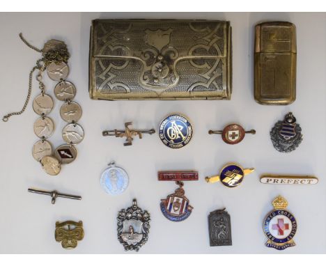 Small collection of badges including an early swastika, Scouts badge stamped silver to reverse, Westbury hallmarked silver ex