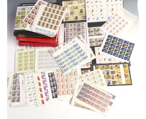Three albums of mint QEII stamps, mainly 1970s-1990s, comprising quarter sheets and larger blocks, together with a large quan