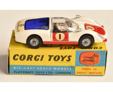 Corgi Toys diecast model Porsche Carrera 6 with white body, red bonnet and doors, blue engine cover, black interior and racin