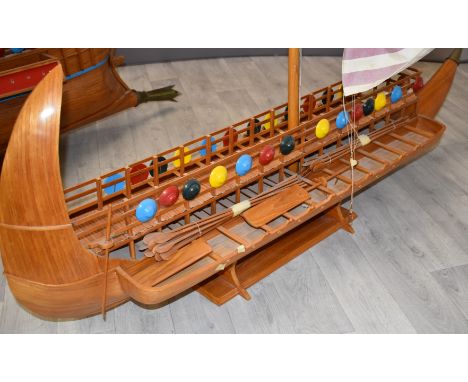 A scratch build model of a Phoenician Galley, early Bireme, with singe mast sail, oars and shields, on purpose build stand, L