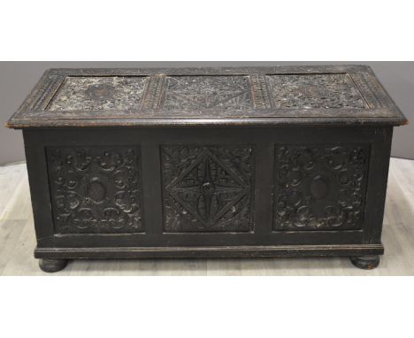 19thC carved oak trunk or coffer raised on bun feet, W132 x D61 x H60cm