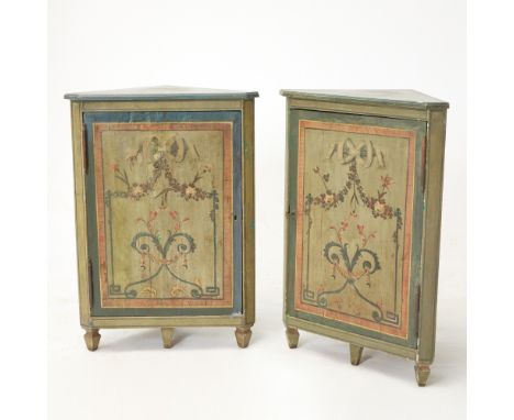Of triangular form, each panel door enclosing a shelf on tapering square legs.Height 38 1/2 inches (98 cm), width 27 1/2 inch