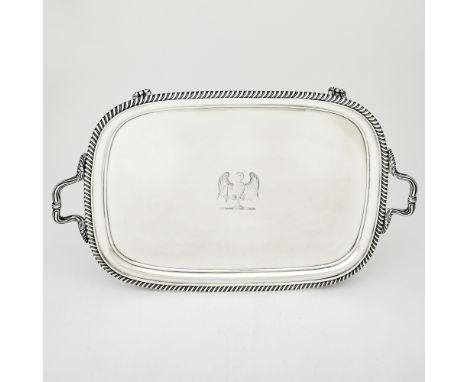 Rectangular with gadrooned rim and loop handles, raised on four bracket feet. Length over handles 23 3/4 inches (60 cm), appr