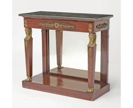 The rectangular fossil marble top above a frieze drawer and later mirror back panel, with caryatids supports raised on rectan