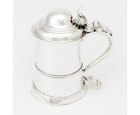 Tapering cylindrical with molded band at waist, the domed hinged cover with scrolling thumbpiece. Height 7 inches (17.8 cm), 