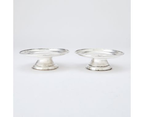 Each circular dished top on a spreading circular foot. Height 2 inches (5 cm), diameter 6 inches (15 cm), total approximately