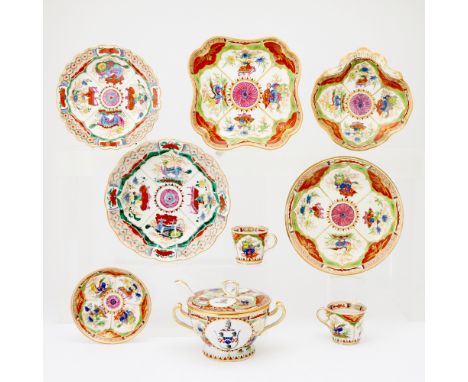18th/19th centuryComprising two scalloped chargers, two scalloped bowls, two salad plates, two teacups and saucers, one shell