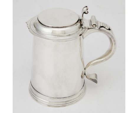 Cylindrical with reeded band at rim and foot, the stepped flat cover with a shaped rim and scrolling thumbpiece. Height 7 inc