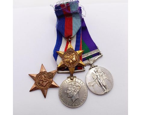 A group of four medals, awarded to 14321729 Gnr R Moss RA, comprising a 1939-1945 Star, a France and Germany Star, a War Meda