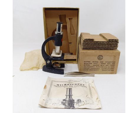 A vintage student's microscope, boxed 