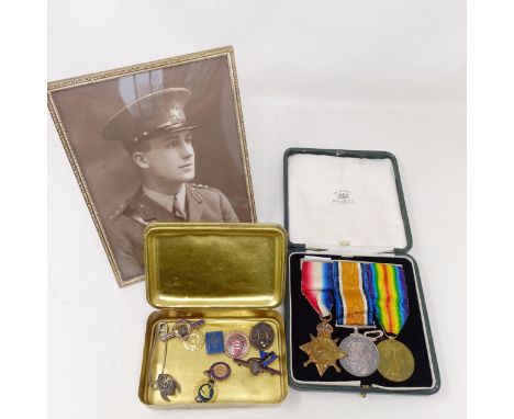 A 1914-15 Star Trio, awarded to 1406 Pte H Tarrant Camb R/2 Lieut M Tarrant, in a Spink & Son box, a photograph, understood t