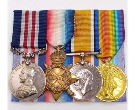 A group of four medals, awarded to 113201 Sjt R E Hunter No 4 Spec Coy RE, comprising a Military Medal and a 1914-15 Star Tri