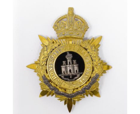 An Essex Regiment helmet plateProvenance: Descent through the family 