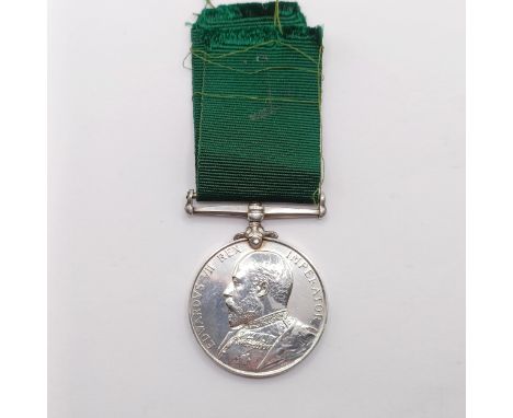 A Volunteer Long Service Medal awarded to 2986 Pte T May 1st VB R Berkshire Regt Provenance:  From a lifetime of medal collec