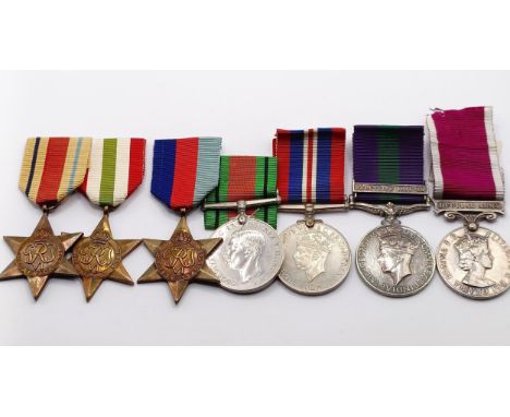 A group of seven medals, awarded to 3312187 Sgt G Anderson R Sigs, comprising a 1939-1945 Star, an Africa Star, an Italy Star