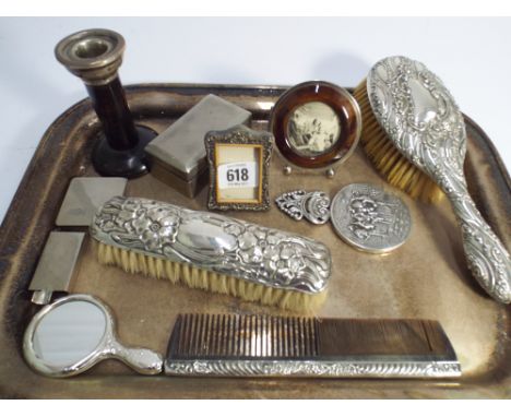 Collection of small silver and silver plated items to include hair brush set, silver mounted candlestick, miniature frame etc