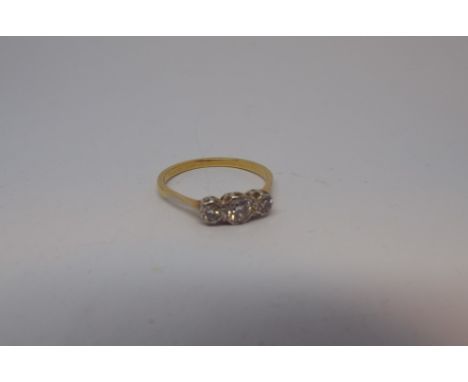 Three stone diamond ring, on 18ct yellow gold shank, ring size O