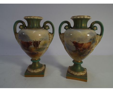 A pair of Royal Worcester twin handled vases decorated with Highland cattle signed Harry Stinton 16cms tall      One vase has