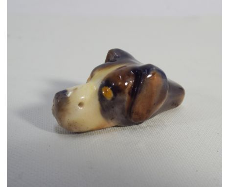 Royal Worcester dog whistle moulded as a dogs head 