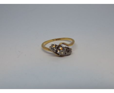 1930's 3 stone diamond cross over design ring in 18ct yellow gold ring size P