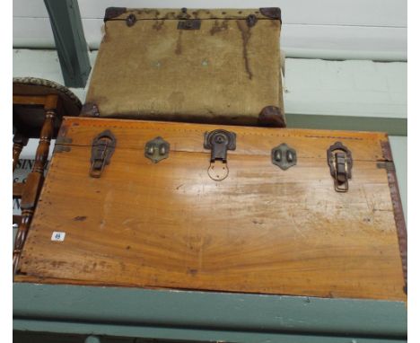 Large old wooden trunk and a slightly smaller trunk 